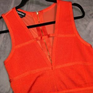 Orange bebe bandage dress